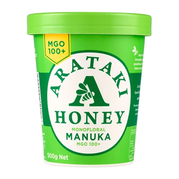 Envase de papel compostable verde con tapa para alimentos, ideal para miel. Alternativa ecológica descartable y sostenible.